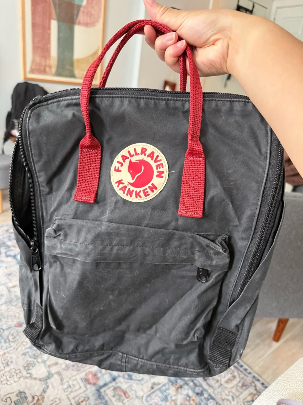Fjallraven Kånken Backpack in Black with Red Handles